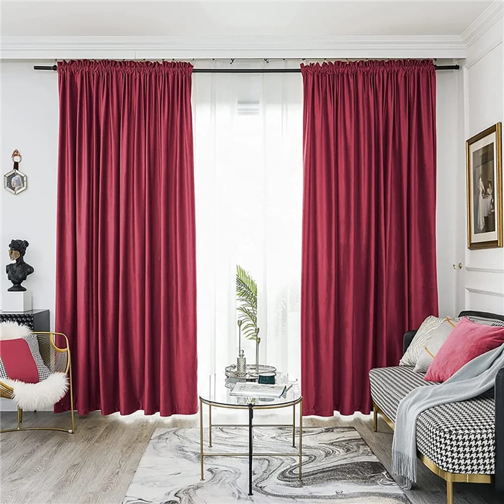Room with cherry red curtain panels and rug